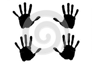 Four black handprints isolated on white background