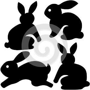 Four Black Rabbit Silhouettes in Various Poses