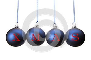 Four blue christmas balls with letters of word XMAS