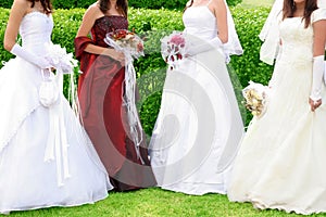 Four brides in wedding dress