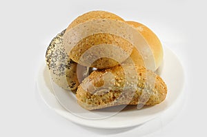 Four buns with different seeds