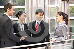 Four Business Colleagues Having Discussion