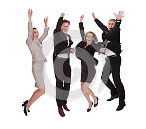 Four business partners jumping for joy