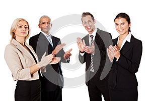 Four business people applauding photo