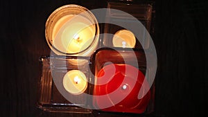 Four candles emit light