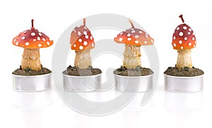 Four candles in mushroom shape