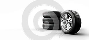 Four car wheels and tires isolated on white background.