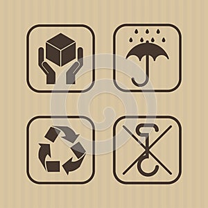 four cardboard infographic seals