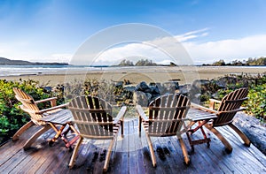 Four Chairs on Deck Overlooking Beach