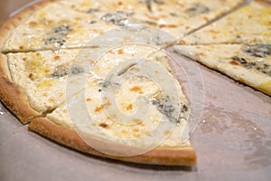Four cheese pizza quattro fromaggi, close up