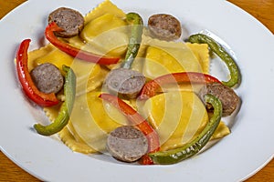 Four cheese ravioli  with sweet italain sausage  and peppers