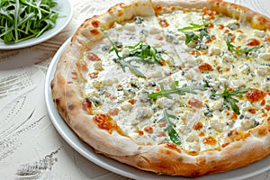 Four Cheeses Pizza with Blue Mold Cheese, Goat Cheese, Mozzarella and Parmesan Closeup