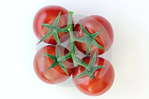 Four cherry tomatoes