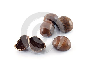 four chestnuts and nutshell isolated on white background