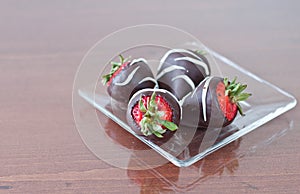 Four chocolate covered strawberries