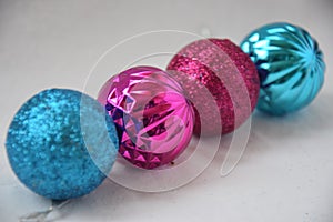 Four christmas balls. Pink. Blue