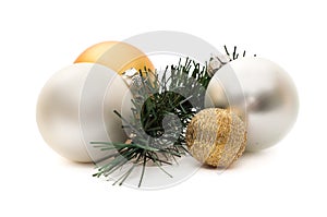 Four christmas spheres and a pine
