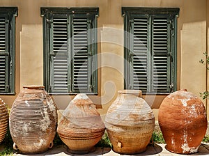 Four Clay Pots On An Athens Sidewalk