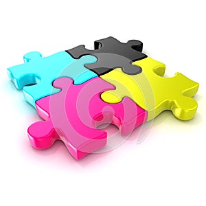 Four CMYK jigsaw puzzle pieces. Top view