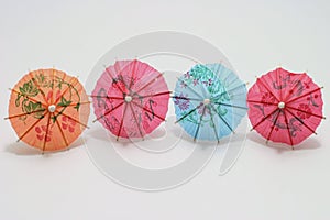 Four coctail umbrellas photo
