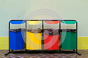 Four colored bins for separate garbage