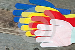 Four colored construction gloves