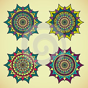 Four colored mandalas