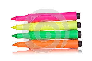 Four colorful highlighter pens