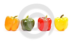 Four colorful paprikas