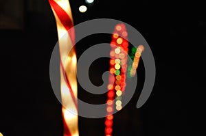 Four colors of blurry lights associated with Christmas.