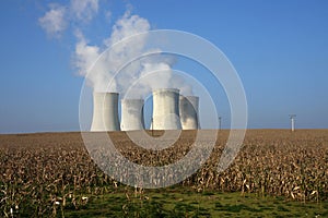 Four cooling towers in agriculture field