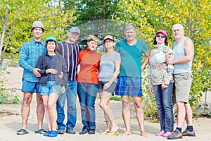 Four couples of beautiful elderly tourists having