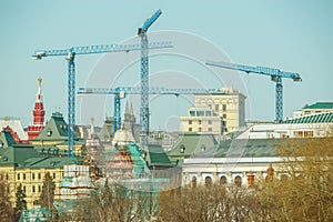 Four cranes above the center of Moscow.