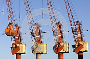 Four cranes in the port