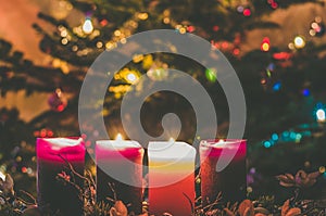 Four burning advent candles background