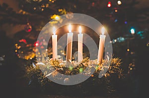 Four burning advent candles background