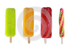 Four delicious frozen Popsicles isolated on white
