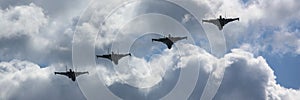 Four destroyers on airshow in white clouds