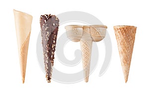 Four different empty ice-cream cones isolated on white