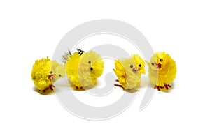 Four Easter chickens dancing on white background