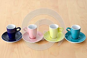 Four espresso cups on the table