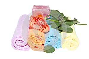 Four facecloth rolls various shades soap and rose