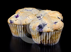 Homemade Blueberry Muffins on Black Background
