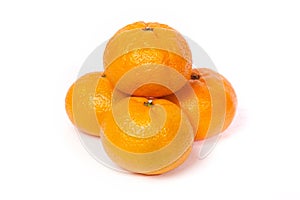 Four fresh mandarin isolated on white