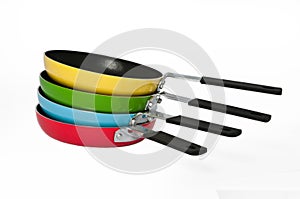 Four frying pans on a white background