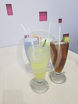 Four glass cups of fresh drink
