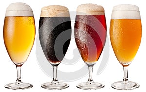 Four glasses with different beers.