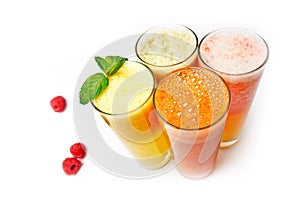 Four glasses of different fresh juice