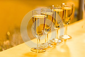 four glasses with sparkling wine