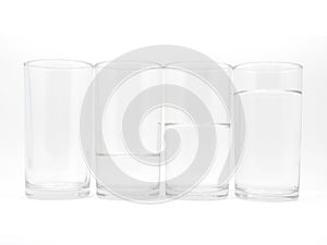 Four glasses with three level of water